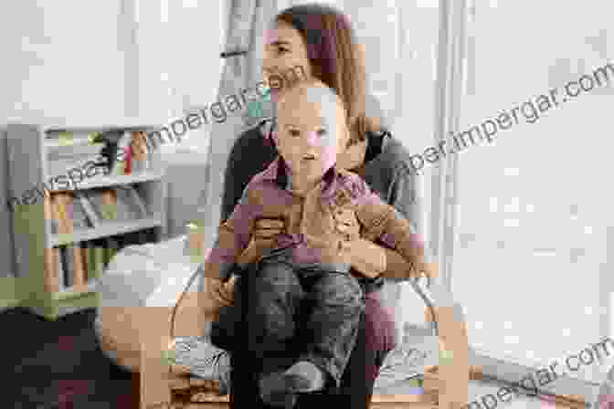 A Happy Child Sitting On A Parent's Lap, Both Smiling And Engaging In A Positive Interaction The Well Behaved Child: Discipline That Really Works