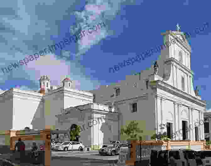 A Panoramic View Of San Juan Bautista, Showcasing Its Historic Buildings And Surrounding Hills. San Juan Bautista Joseph McMahon