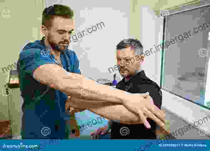 Therapist Performing A Manual Muscle Strength Test Clinical Pathways: An Occupational Therapy Assessment For Range Of Motion Manual Muscle Strength